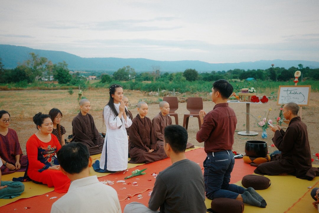 person meditating outdoors