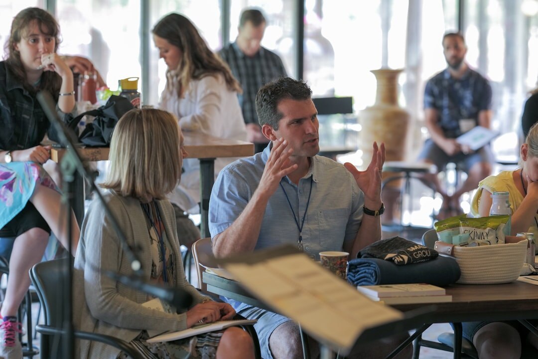 man giving presentation to small group
