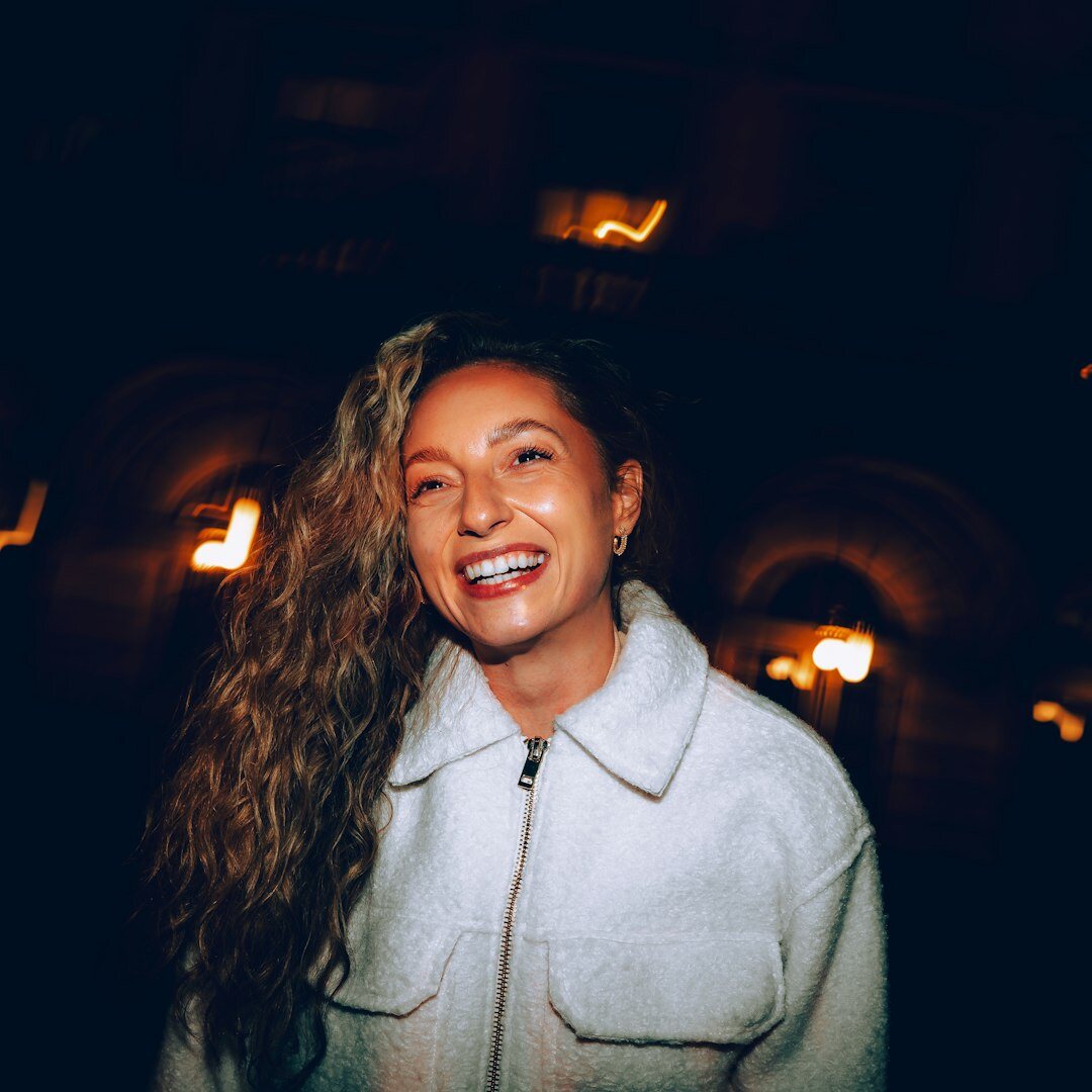 Portrait of a young woman laughing