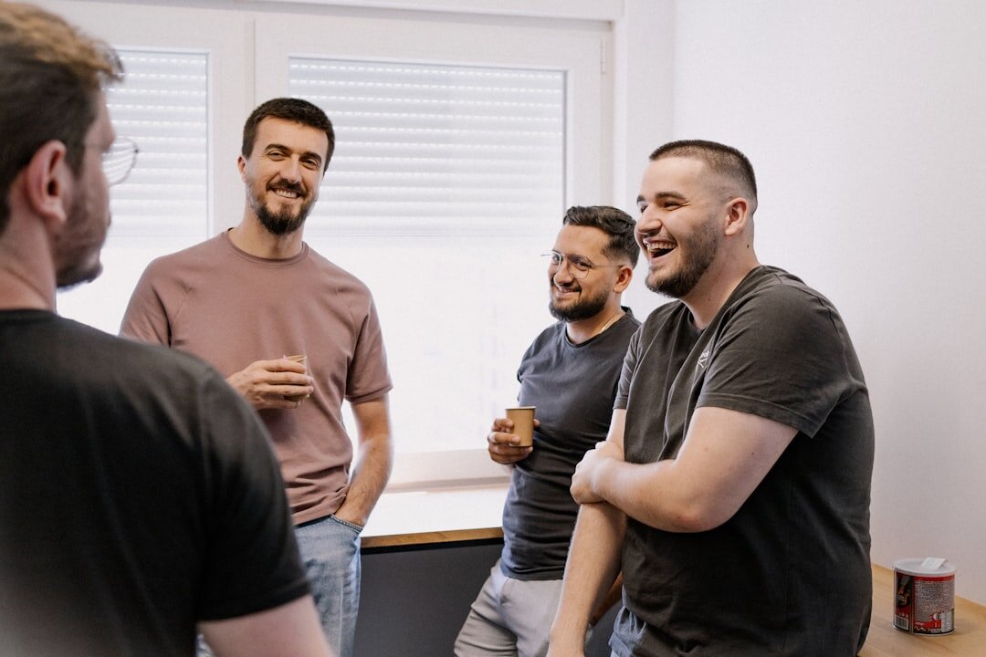 Group of people in a circle talking during a workshop